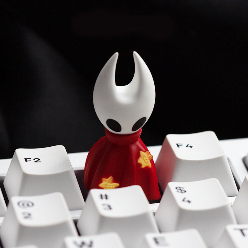 Gaming setup with Hollow Knight theme keyboard