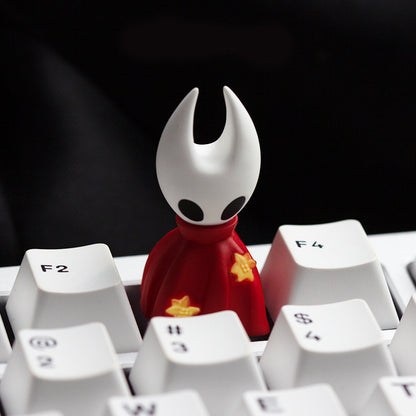 Gaming setup with Hollow Knight theme keyboard